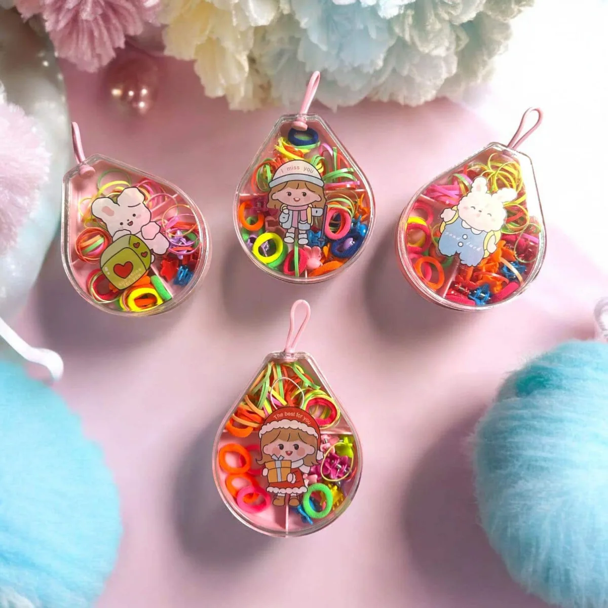 Set 12 cutiuțe lacrimă cu elasticuțe colorate pentru copii - accesorii de păr prezentate într-un ambalaj adorabil și practic En Gros — Image 1